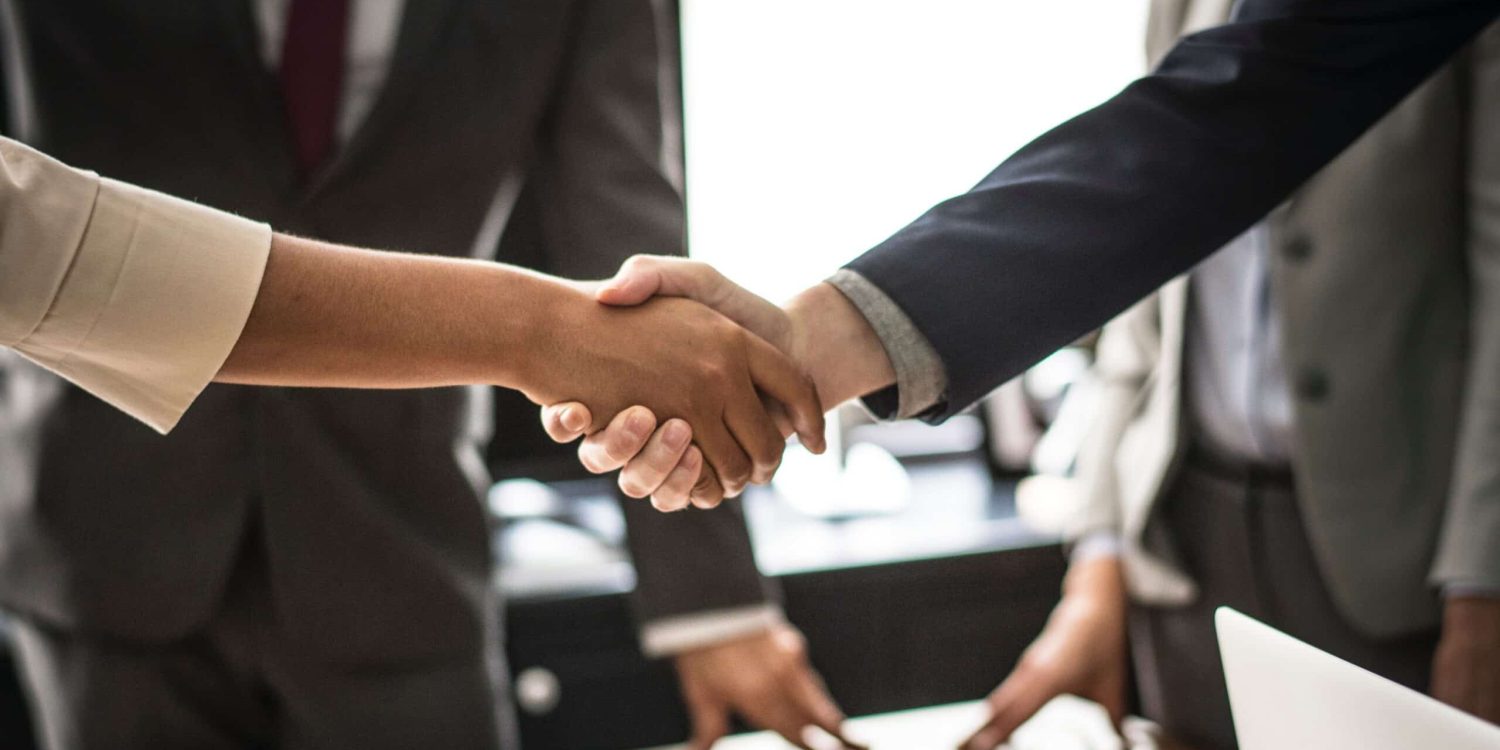 two-person-handshaking